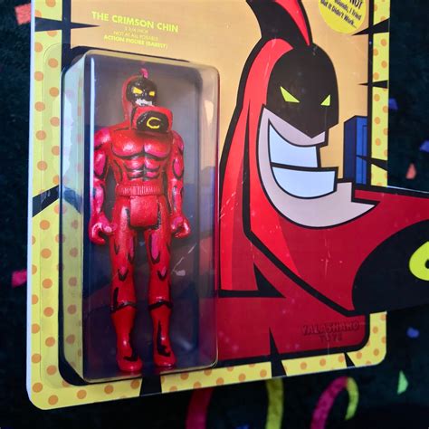 crimson chin toy.
